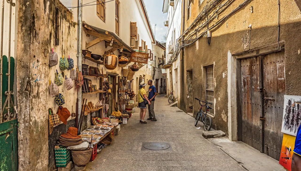 A narrow shopfront street in Stone Town, Zanzibar