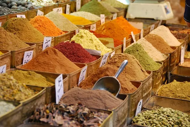 Spices in open baskets at a Zanzibar market